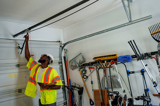 Professional Garage Door Installation technician working in Marshfield Hills, MA